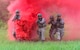 Airmen with the 182nd Security Forces Squadron, Illinois Air National Guard, maneuver through concealment smoke during shoot, move, communicate training in Peoria, Ill., July 20, 2016. The training was designed to practice fire team communication and movements while engaging simulated combatants. (U.S. Air National Guard photo/Staff Sgt. Lealan Buehrer)      