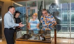 Family and friends of a World War II prisoner of war visit the Defense POW/MIA Accounting Agency (DPAA) for a tour of the facility, June 30. The mission of DPAA is to provide the fullest possible accounting for our missing personnel to their families and the nation.