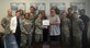 James Brown, front right, 47th Flying Training installation deployment officer, accepts the “XLer of the Week” award from Col. Michelle Pryor, front left, 47th Flying Training Wing commander, here, July 20, 2016. The XLer is a weekly award chosen by wing leadership and is presented to those who consistently make outstanding contributions to their unit and Laughlin. (Courtesy photo)