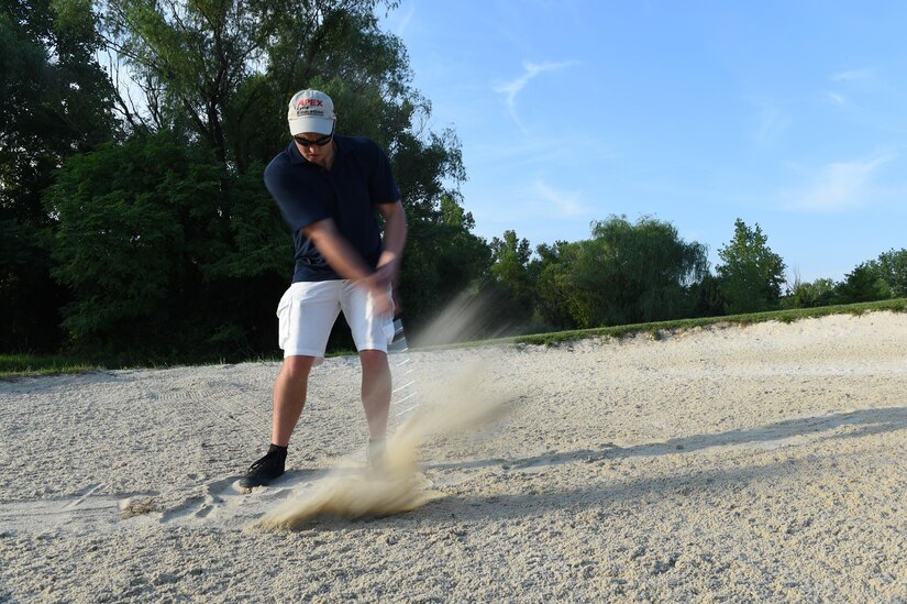 Staff Sgt. William Parks, 811th Security Forces Squadron protective services team leader, plays golf at The Courses on Joint Base Andrews, Md., July 23, 2016. More than 100,000 rounds are played by approximately 150,000 people annually, generating revenue for the installation. (U.S. Air Force photo by Senior Airman Joshua R. M. Dewberry)