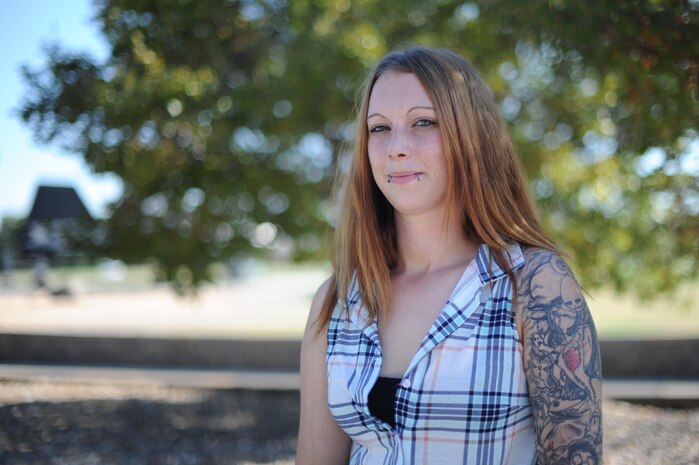 Kelly R. Lind, Beale Exchange military clothing supervisor, poses for a photo July 26, 2016, at Beale Air Force Base, California. (U.S. Air Force photo by Senior Airman Tara R. Abrahams)
