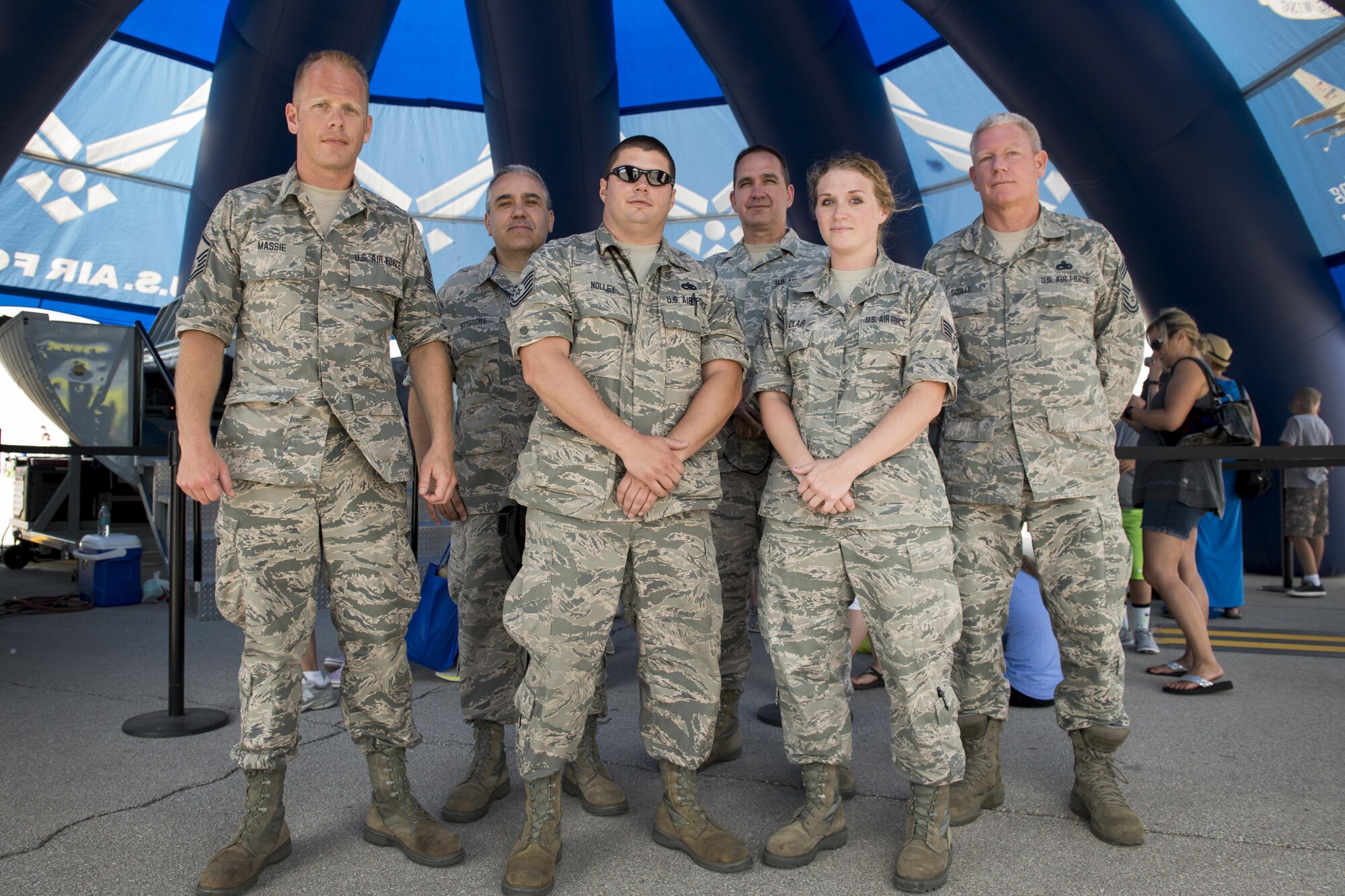 From left to right, Master Sgt. James Massie, 434th Maintenance Squadron aircraft machinist; Senior Master Sgt. Douglas Stogsdill, 434th MXS fabrications flight chief; Tech. Sgt. Derek Nolley, 434th MXS electronics environmental specialist; Senior Master Sgt. Charles Hoover, 434th Aircraft Maintenance Squadron flight chief; Staff Sgt. Kelsey St. Clair, 434th MXS structural aircraft specialist; and Chief Master Sgt. Richard Scully, 434th Maintenance Group quality assurance superintendent, pose for a photo at the Dayton Vectron Airshow in Dayton, Ohio, June 18, 2016. During the event, the six Airmen setup up and operated Grissom’s interactive flight deck and boom pod displays while sharing their military knowledge with visitors. (U.S. Air Force photo/Tech. Sgt. Benjamin Mota)