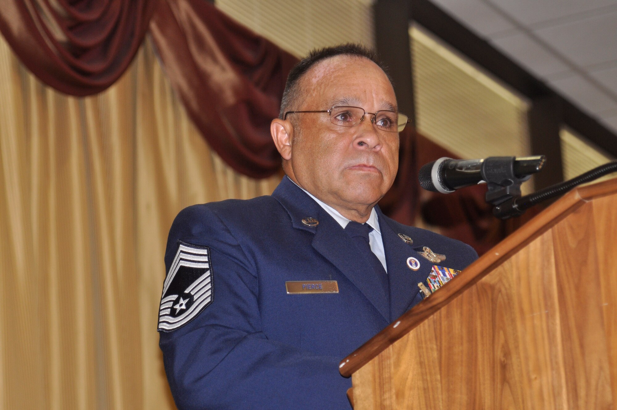 Chief Master Sgt. Tony Pierce, chief boom operator with the 78th Air Refueling Squadron gives his final address at his retirement ceremony held July 16 at Tommy B's Community Center, here. Chief Pierce served more than 30 years with the New Jersey Reserve unit. (U.S. Air Force photo/Lt. Col. Kimberly Lalley)
