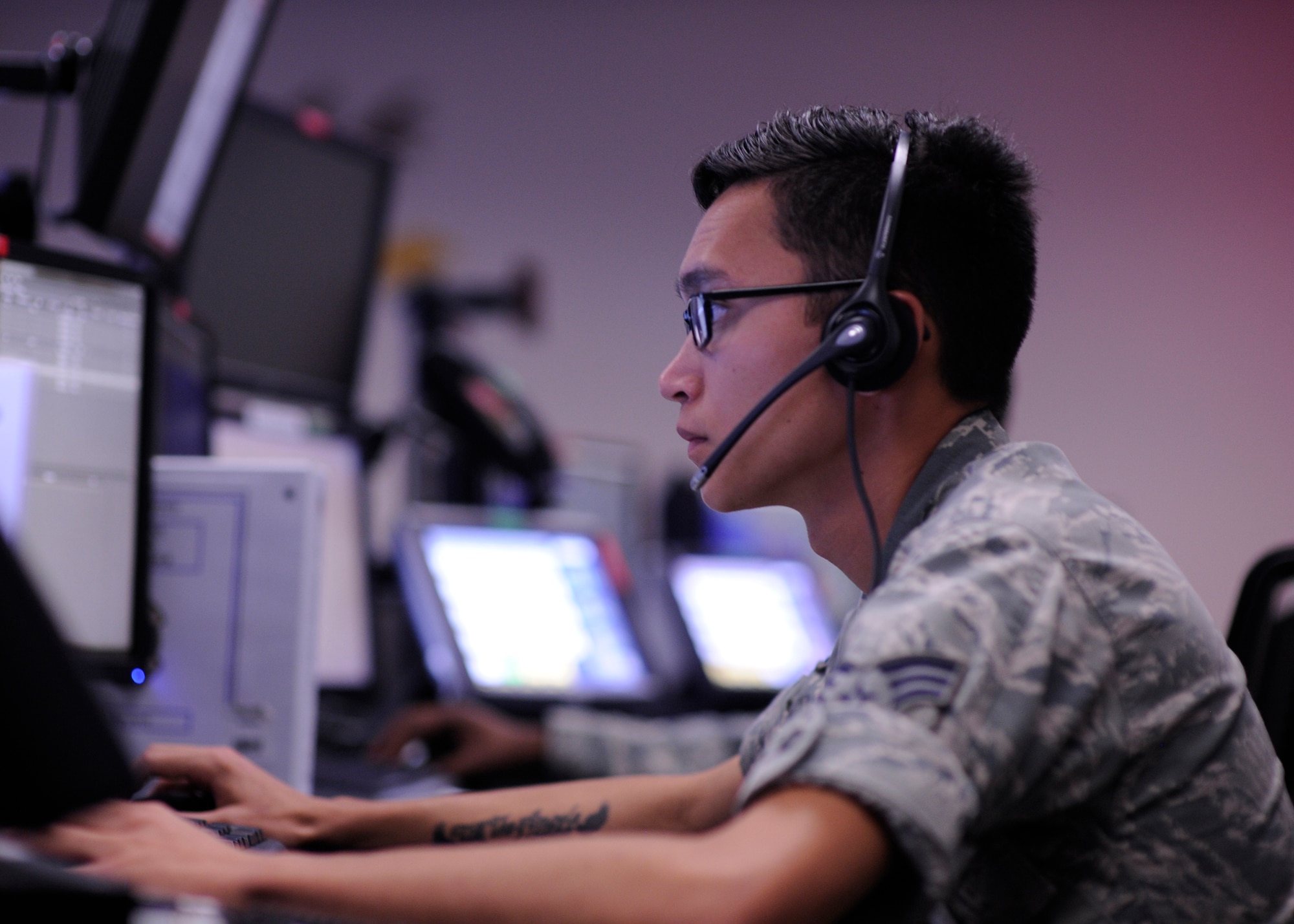 Senior Airman Dakota Rimbach from the 81st Range Control Squadron runs a command and control mission at the 81st RCS, Tyndall Air Force Base, Fla., July 26,2016. The 81st RCS provides command and control in support of the 53rd Weapons Evaluation Group mission. (U.S. Air Force photo by Senior Airman Solomon Cook/Released)