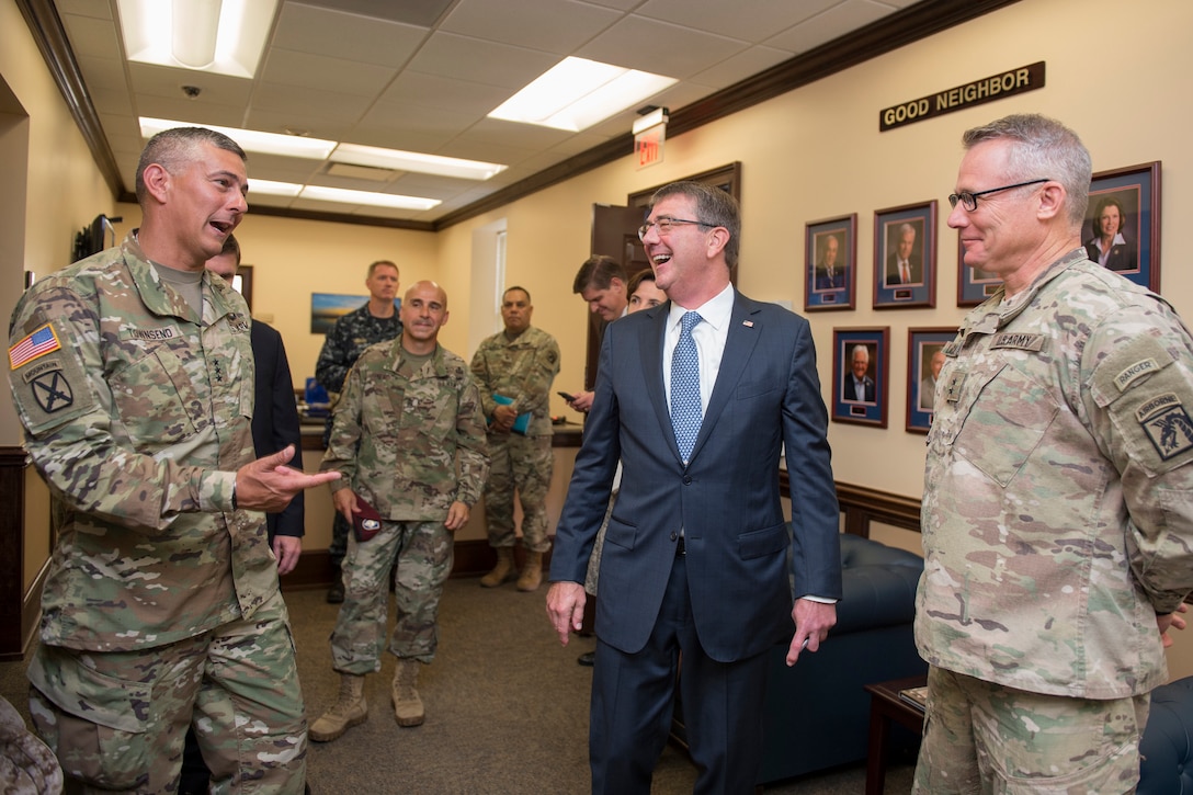 Defense Secretary Ash Carter shares a light moment with Army Lt. Gen. Stephen Townsend, left, XVIII Airborne Corps commanding general, during a visit to Fort Bragg, N.C., July 27, 2016. DoD photo by Air Force Tech. Sgt. Brigitte N. Brantley