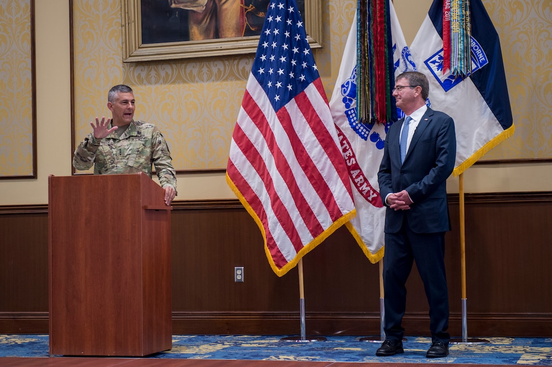 Army Lt. Gen. Stephen Townsend, XVIII Airborne Corps commanding general, introduces Defense Secretary Ash Carter before he talks with deploying troops during a visit to Fort Bragg, N.C., July 27, 2016. DoD photo by Air Force Tech. Sgt. Brigitte N. Brantley