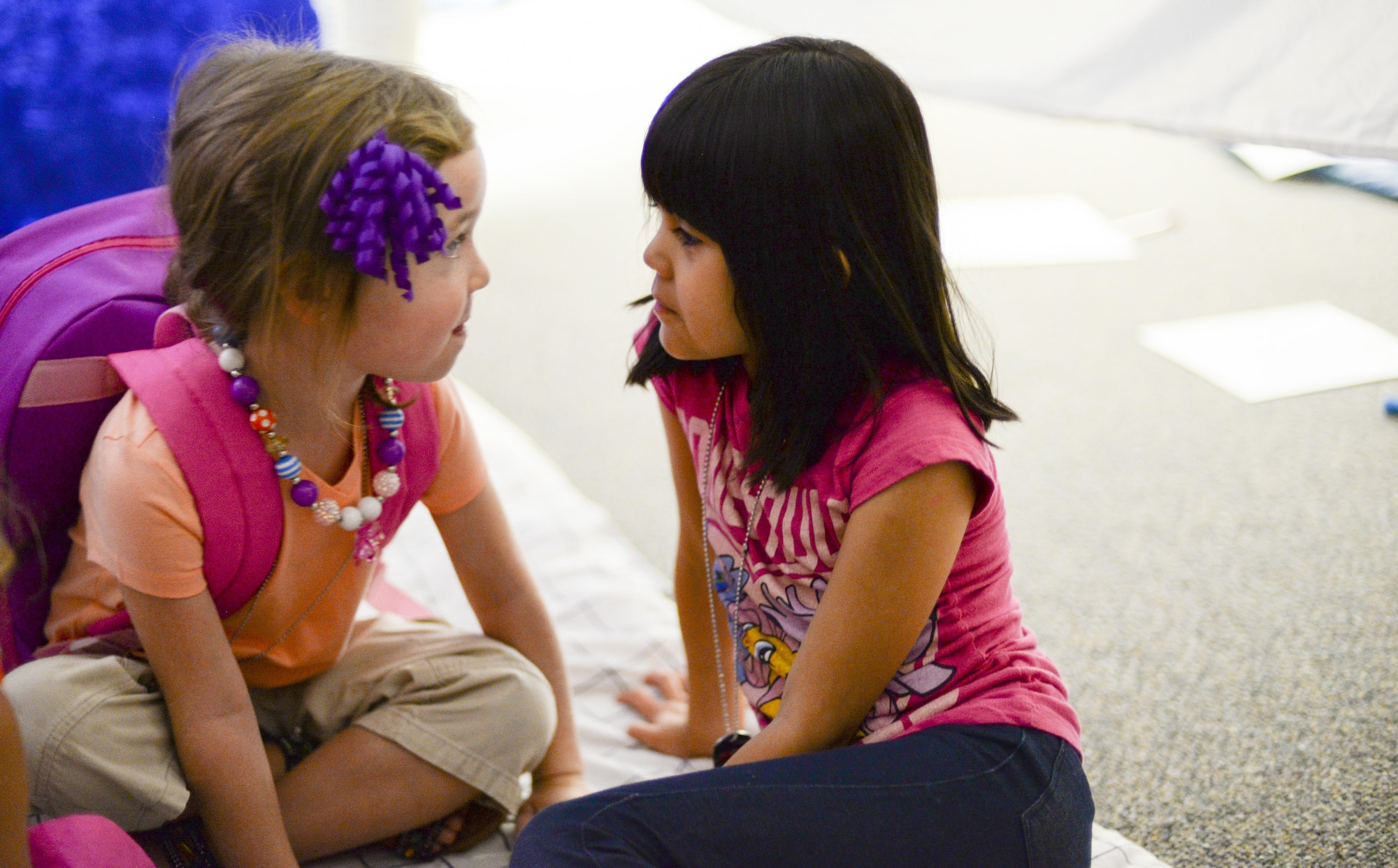 Sienna and Annalyse, two children attending the base chapel’s vacation bible school, talk to one another during a volunteer-led discussion at Holloman Air Force Base, N.M., on July 20. Holloman Chapel’s vacation bible school is a five-day program, offered to elementary aged children. (Last names are being withheld due to operational requirements. U.S. Air Force photo by Amn Alexis P. Docherty/released) 