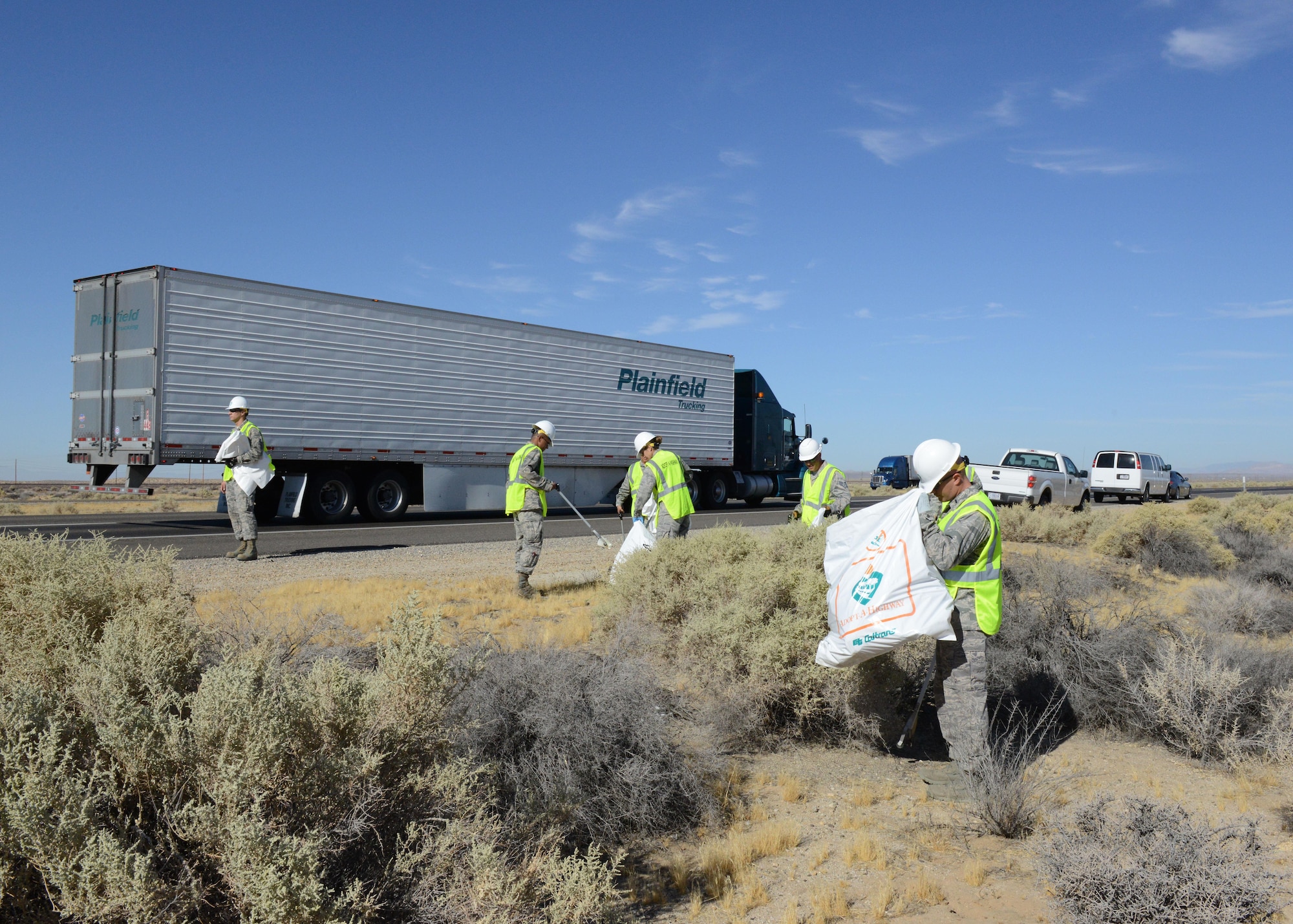 Air Force Research Laboratory Airmen took to Highway 58 to pick up trash July 22 as part of Caltrans' Adopt-A-Highway program. (U.S. Air Force photo by Kenji Thuloweit)