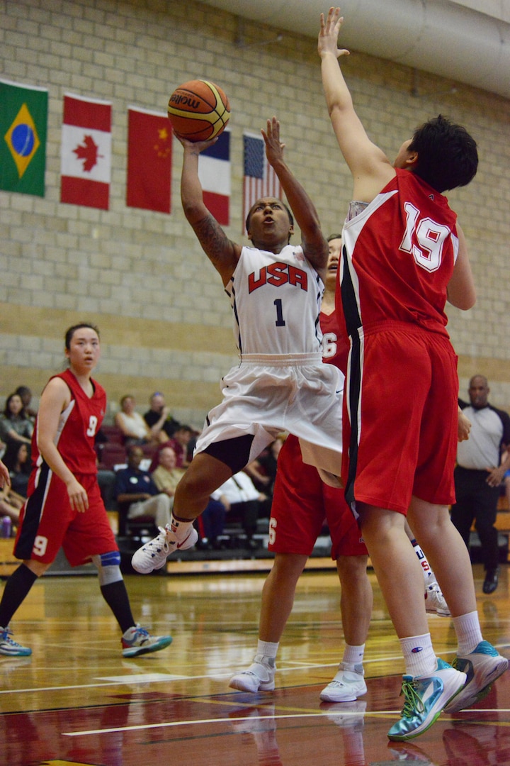 Danielle DeBerry of Fort Bragg, N.C., goes up for a shot against China's Tianyang Zhang during USA's game three of the CISM Women's Basketball Championship, July 27, 2016, at Camp Pendleton, Calif. USA beat China 73-56.