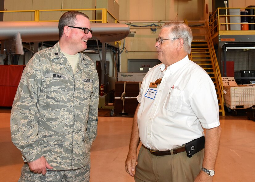 U.S. Air Force Lt. Col. Christopher Otten speaks with a member of the Chesapeake Gateway Chamber of Commerce during a base tour July 27, 2016 at Warfield Air National Guard Base, Baltimore, Md.  The chamber was able to meet with the adjutant general of Maryland as well as see an A-10 static display. (U.S Air National Guard Photo by Airman 1st Class Enjoli Saunders/RELEASED)