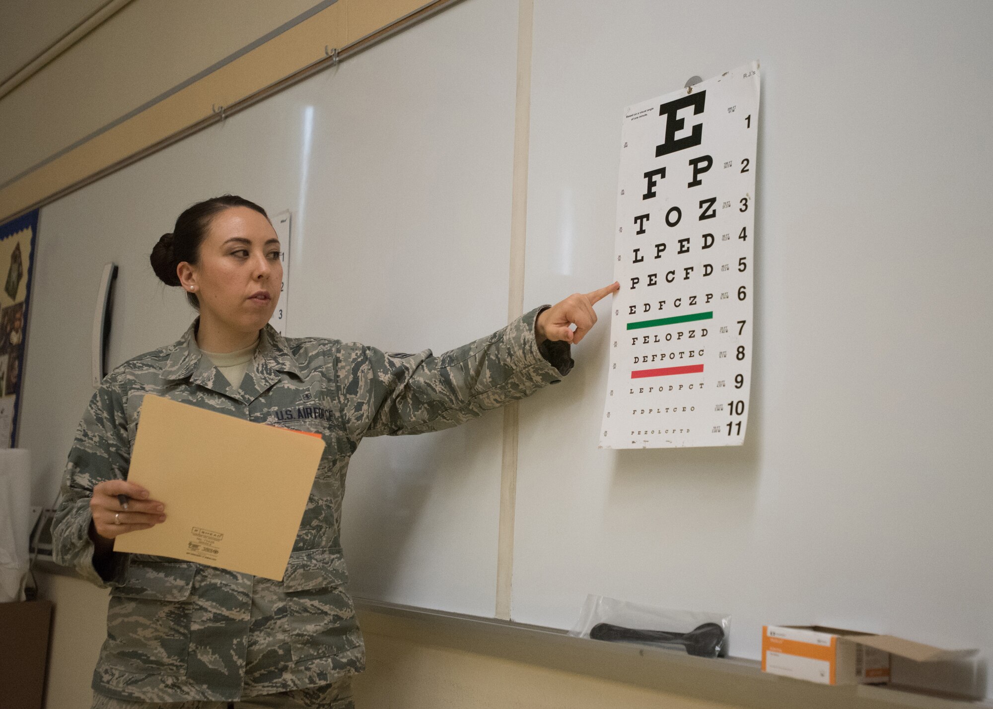 U.S. Air Force Airman 1st Class Danielle Fuhriman, an aerospace medical technician from the 173rd Medical Group, Oregon Air National Guard, conducts a vision test at Paducah Tilghman High School in Paducah, Ky., July 18, 2016, during Bluegrass Medical Innovative Readiness Training. The Kentucky Air National Guard, U.S. Navy Reserve and other military units are teaming with the Delta Regional Authority to offer medical and dental care at no cost to residents in three Western Kentucky locations from July 18 to 27 as part of the training event. (U.S. Air National Guard photo by Master Sgt. Phil Speck)