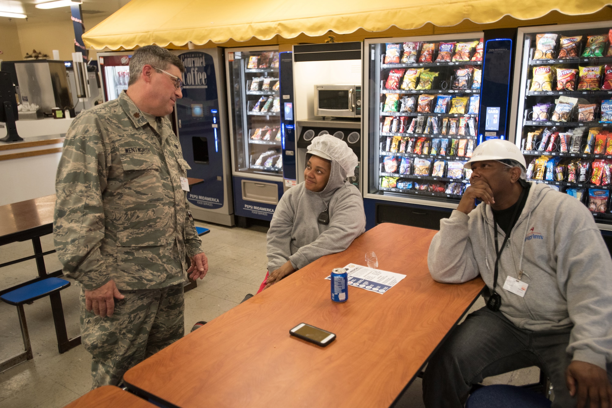 U.S. Air Force Maj. Kerry Wentworth, a chaplain from the Kentucky Air National Guard’s 123rd Airlift Wing, speaks to workers in a break room at the Pilgrim’s chicken processing plant in Mayfield, Ky., July 21, 2016, to help spread the word Bluegrass Medical Innovative Readiness Training. The Kentucky Air National Guard, U.S. Navy Reserve and other military units are teaming with the Delta Regional Authority to offer medical and dental care at no cost to residents in Mayfield and two other Western Kentucky locations from July 18 to 27 as part of the training event. (U.S. Air National Guard photo by Master Sgt. Phil Speck)