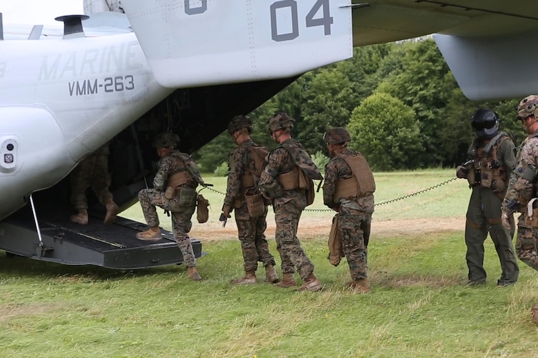 U.S. Marines with Charlie company, 1st Battalion 8th Marine Regiment, Special Purpose Marine Air-Ground Task Force-Crisis Response-Africa board an MV-22B Osprey during a combined arms attack aboard Camp Sissonne, France, June 21, 2016. CENZUB provided SPMAGTF-CR-AF Marines with the ability to maintain their proficiencies in urban combat and integrate with French personnel and assets in a realistic scenario. (U.S. Marine Corps photo by Sgt. Kassie McDole/Released.)