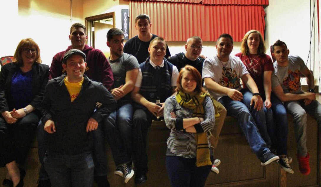 U.S. Air Force Airmen pose for a photograph following an improv show, “RAF Out Loud” and “The Show That Shall Not Be Named,” June 18, 2016, on RAF Mildenhall, England. The group welcomes people from the tri-base area including dependents and civilians. (Courtesy photo)