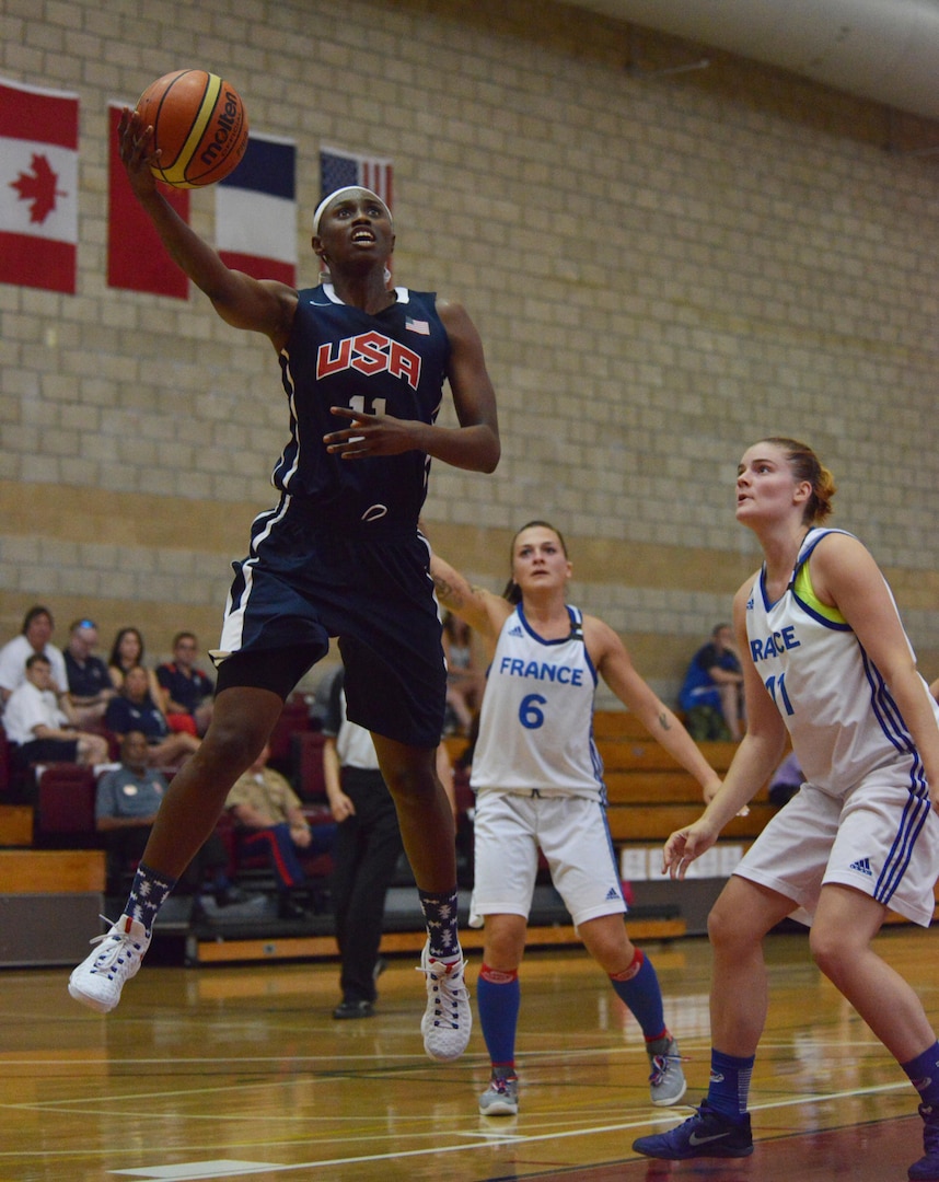 Sgt. Creshenda Singletary of Fort Bragg, N.C.,  hooks it over a French defender during USA's 85-53 win over France, July 26, 2016, at the CISM Women's Basketball Championship tournament at Camp Pendleton, N.C.