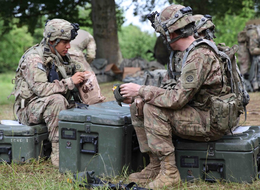 82nd Airborne Division soldiers eat Meals, Ready to Eat before a training at the Joint Multinational Readiness Center, in Hohenfels, Germany June 22. The U.S. Army Natick Soldier Research Development and Engineering Center conducted operational ration field trials in July at Fort Carson, Colorado to give service members a chance to test prospective Meals, Ready to Eat components and Unitized Group Rations.