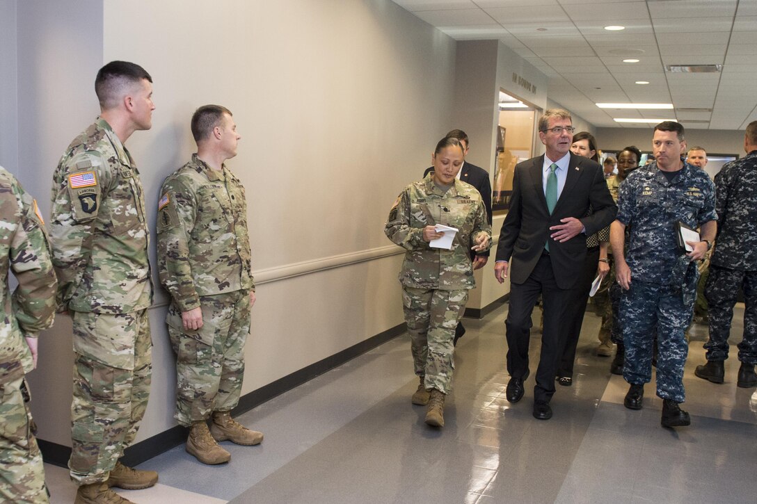 Defense Secretary Ash Carter meets with workers during a visit to the Chicago Military Entrance Processing Station in Chicago, July 28, 2016. DoD photo by Air Force Tech. Sgt. Brigitte N. Brantley