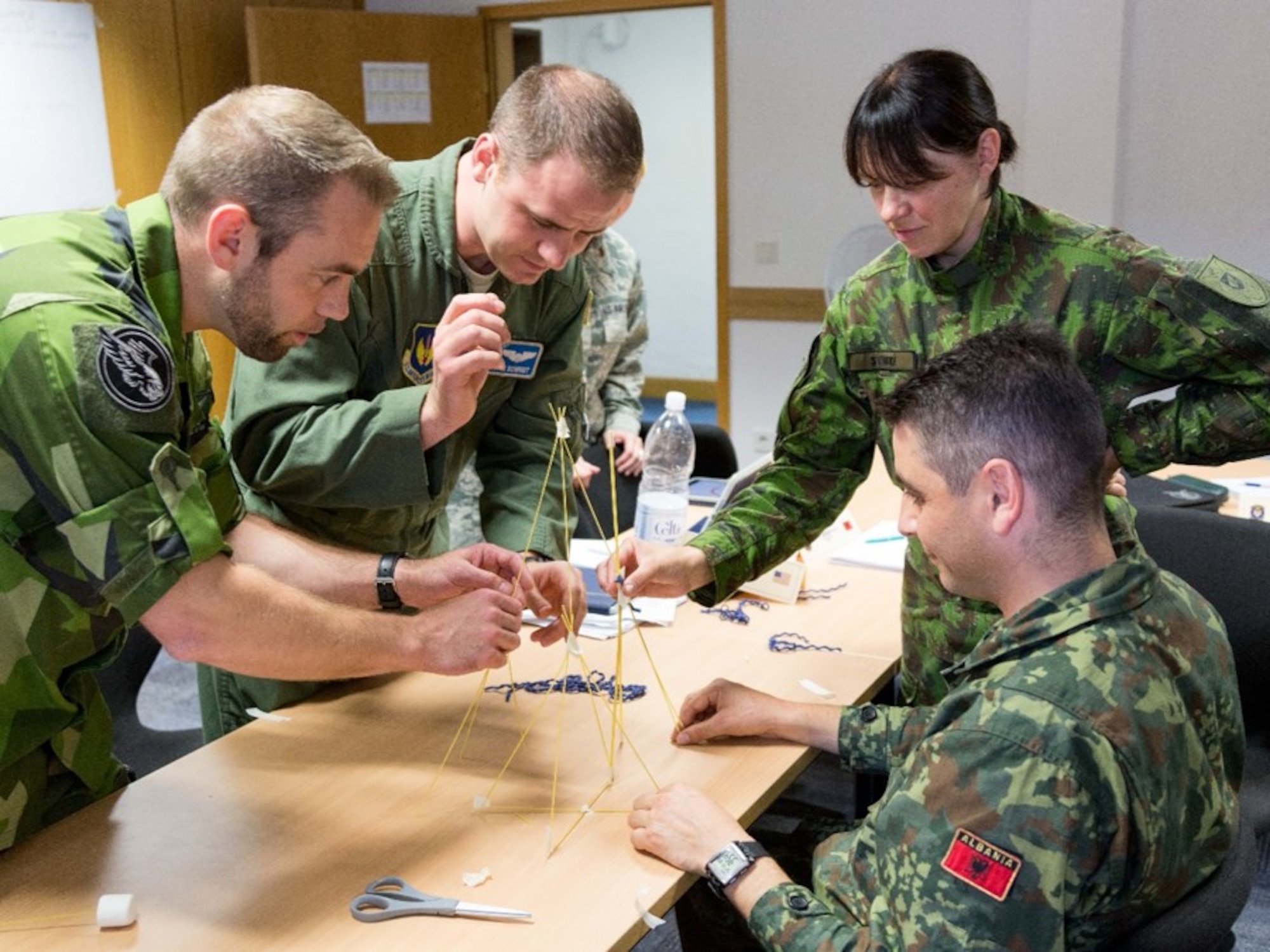 U.S. Air Force Capt. Justin Schmidt, 37th Airlift Squadron pilot, participates in a strategic thinking exercise during the Inter-European Air Force Academy’s second combined Squadron Officer School and NCO Academy in-residence course at Kapaun Air Station, Germany. From June 20 to July 22, 2016, 43 officer and NCO students from 13 European nations and the U.S. participated in the courses. (U.S. Air Force photo/Senior Master Sgt. Travis Robbins)