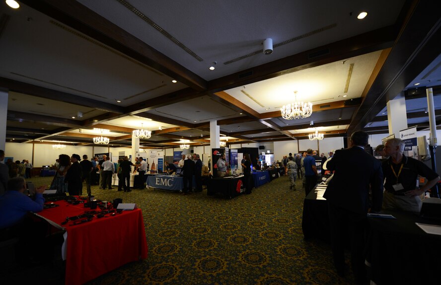 Participants attend the Ramstein Technology Exposition at Ramstein Air Base, Germany, July 19, 2016. More than 60 companies exhibited their technology for two days at the Officer’s Club. (U.S. Air Force photo/ Airman 1st Class Joshua Magbanua)