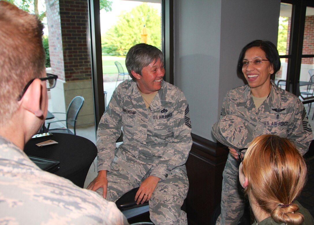 The highest ranking enlisted leader at Air Force Reserve Command in Warner Robins, Georgia, Command Chief Chief Master Sgt. Ericka Kelly (right),  talks about mentoring as part of the 932nd Airlift Wing's Professional Development Seminar.  The action packed course was held July 7-8, 2016, at Scott Air Force Base.  The event allowed unit members a chance to ask questions and hear about how enlisted Air Force Airmen and officers made successes out of various challenges in their careers. (U.S. Air Force photo by Maj. Stan Paregien)
