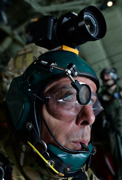 Cpl. Ian Chapman, British army combat engineer, prepares to jump from a C-130J Super Hercules over Bitburg Airfield, Germany, July 26, 2016. International Jump Week was conducted by the U.S. and seven other allied nations. (U.S. Air Force photo/Senior Airman Nesha Humes)