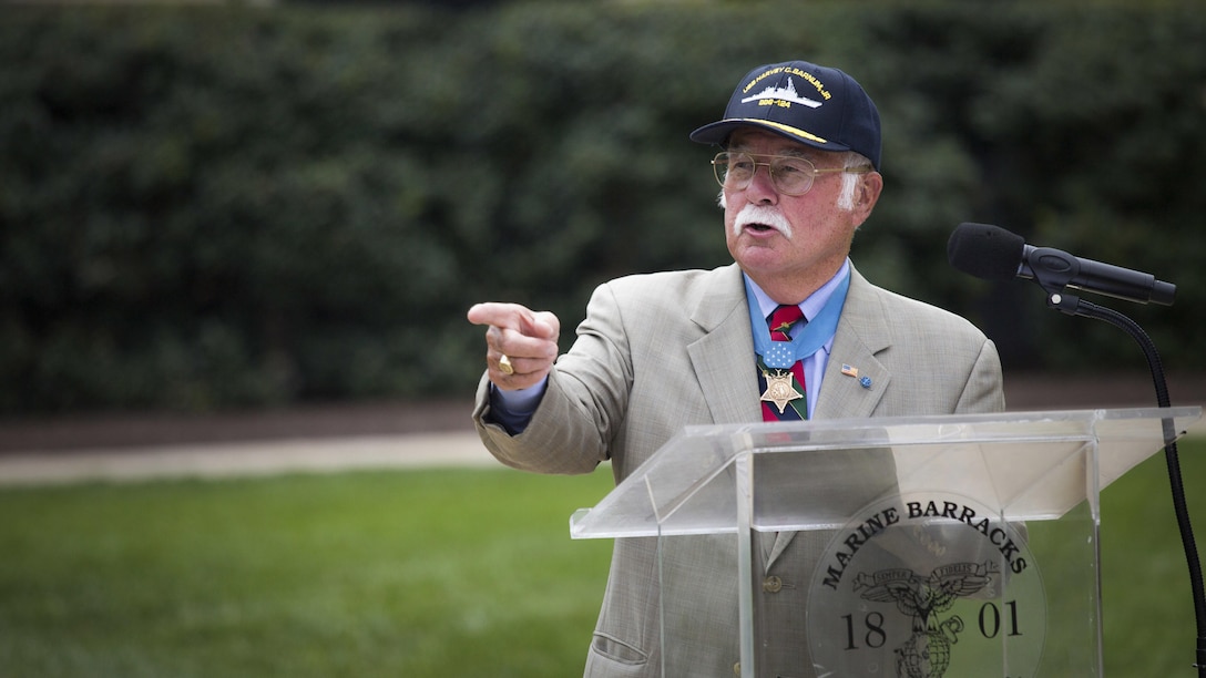 Retired Marine Col. Harvey C. Barnum, Jr. speaks at the official renaming of Arleigh Burke-class destroyer, DDG-124, to the USS Harvey C. Barnum, Jr. at Marine Barracks Washington, July 28, 2016. Col. Barnum received the Medal of Honor during Operation Harvest Moon in the Vietnam War. With a length of 505 ft., and weaponry including over 90 missiles, Arleigh Burke-class destroyers are among the largest and most heavily armed destroyers in the United States arsenal. 