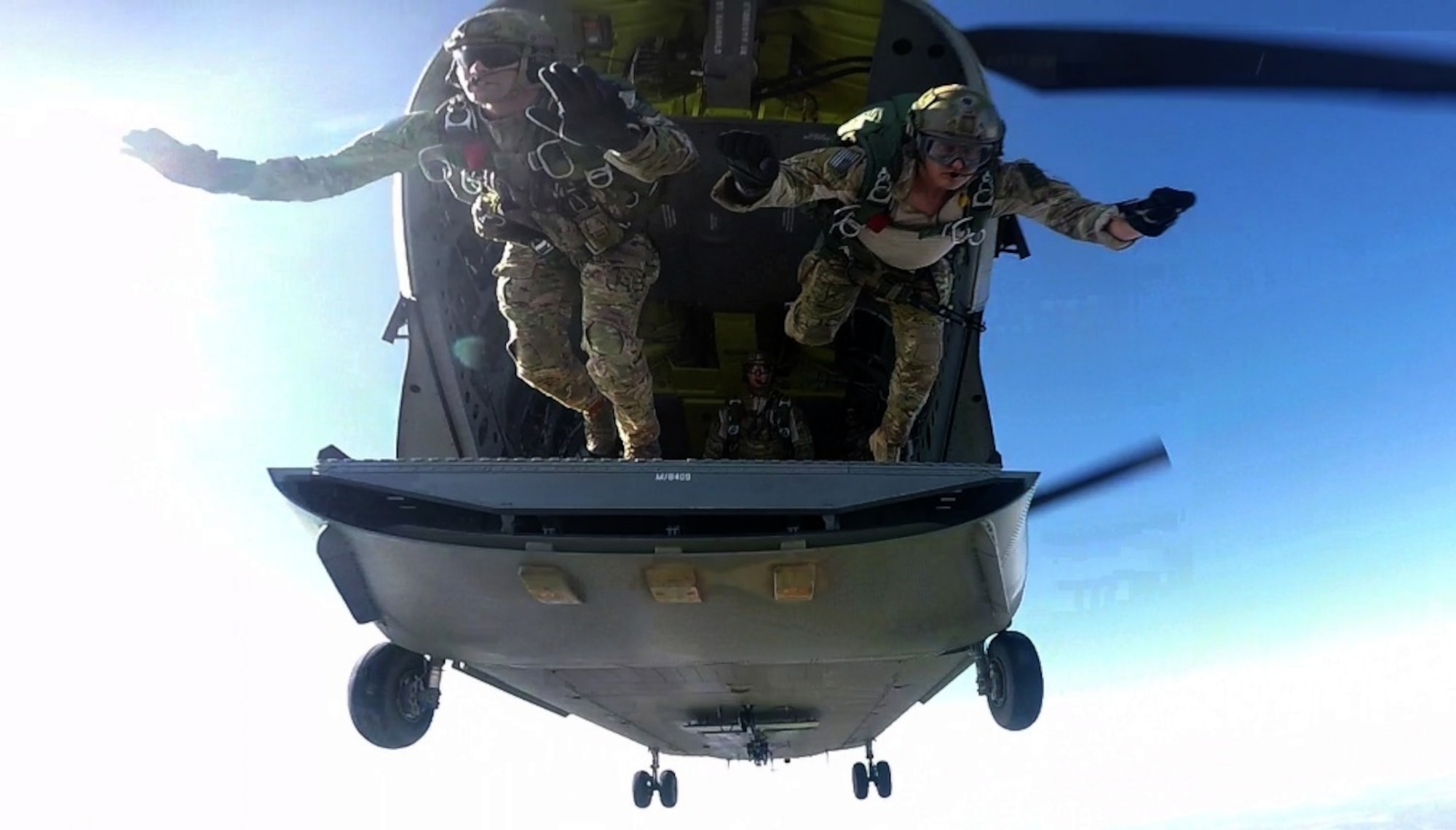 U.S. Air Force special tactics Airmen assigned to the 24th Special Operations Wing conduct a freefall jump from a U.S. Army CH-47 Chinook assigned to 5th Battalion, 159th Aviation Regiment, Fort Eustis, Va., during Exercise Emerald Warrior 16 over Eglin Range, Fla., May 7, 2016. Emerald Warrior is a U.S. Special Operation Command sponsored mission rehearsal exercise during which joint special operations forces train to respond to real and emerging worldwide threats. (U.S. Air Force still frame from video by Tech. Sgt. Gregory Brook) 
