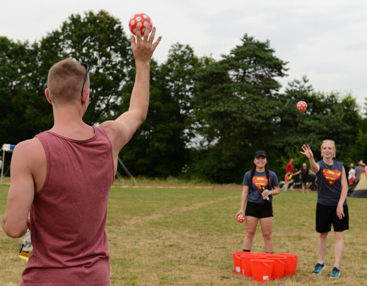 Participants in the 2016 Viking Challenge play a game of water pong July 22, 2016, at Pulaski Barracks, Germany. Every other hour, events such as cornhole, water pong, tire flipping and water balloon tosses were held. (U.S. Air Force photo/Airman 1st Class Savannah L. Waters)