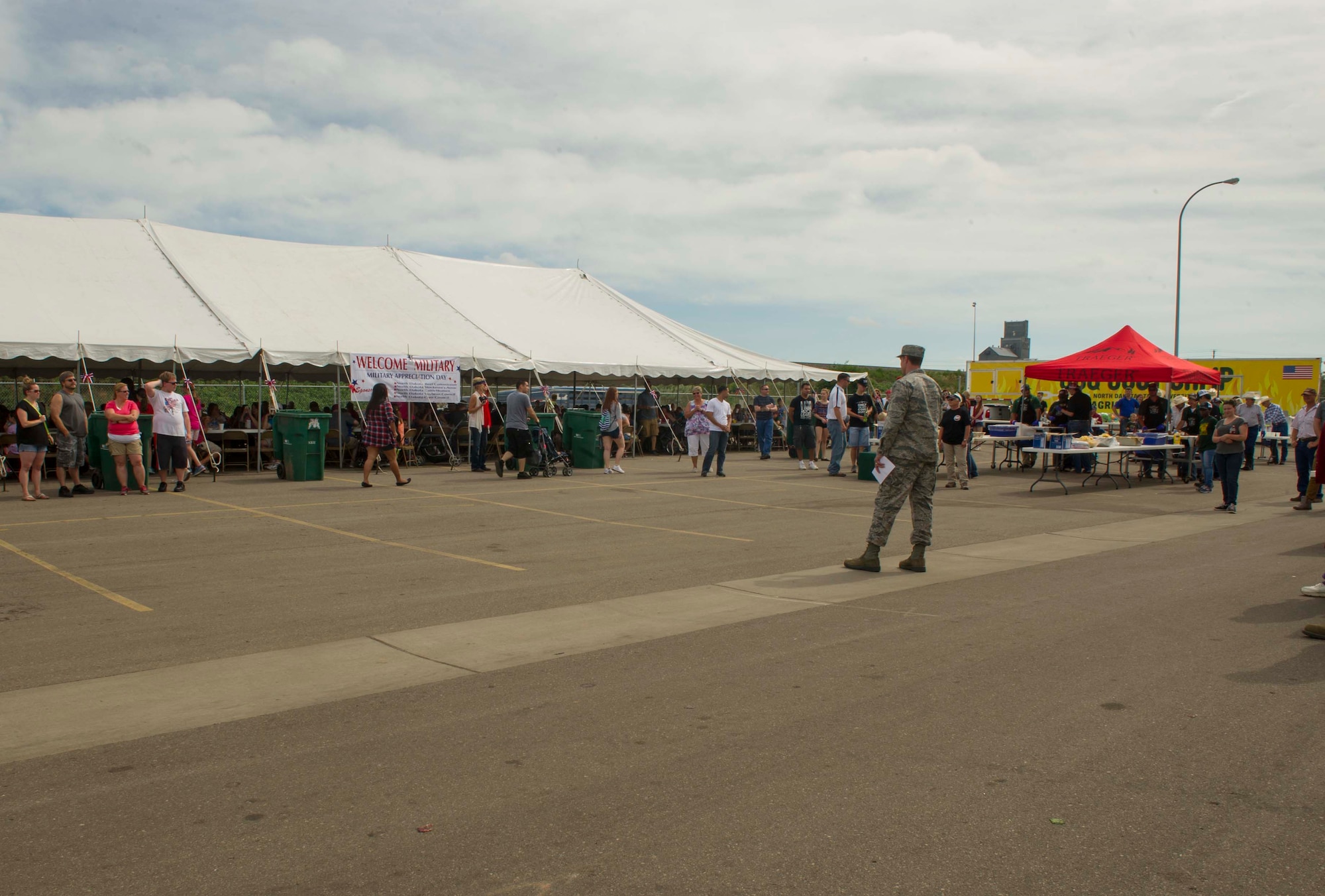 Col. Matthew Brooks, 5th Bomb Wing commander, speaks during Military Appreciation Day at the North Dakota State Fair in Minot, N.D., July 26, 2016. Brooks thanked the sponsors of the event for their unwavering support of the military. (U.S. Air Force photo/Senior Airman Apryl Hall)