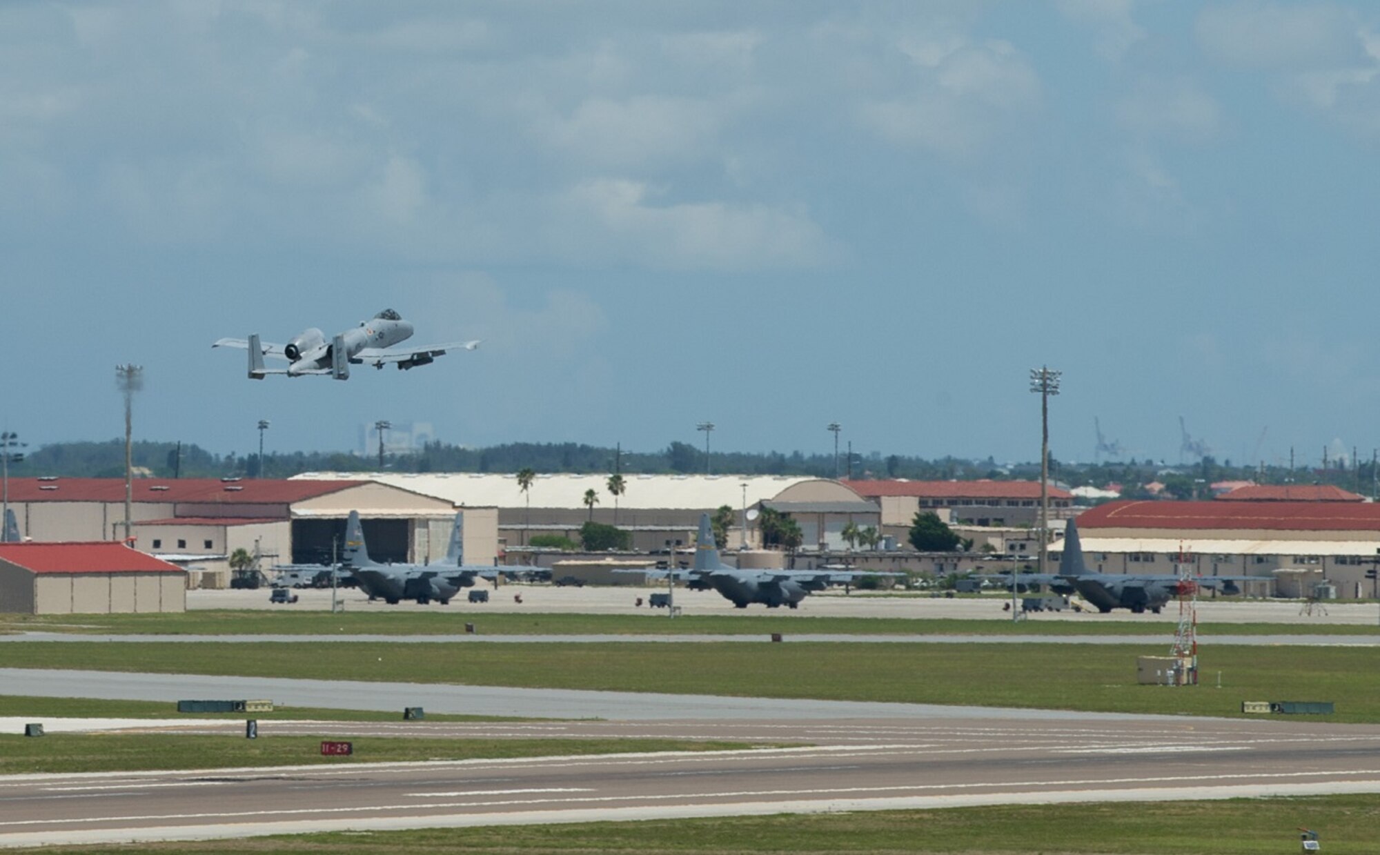 A photo taken from the 45th Operations Support Squadron’s air traffic control tower captures an A-10 Thunderbolt II taking off from Patrick Air Force Base, Fla., July 19, 2016.  The 45th Space Wing hosted the 924th Fighter Group from Davis-Monthan Air Force Base, Arizona, who were here to train with the 920th Rescue Wing's helicopter squadron, the 301st Rescue Squadron, July 18-29, 2016. The 301st RQS operates the HH-60G Pave Hawk helicopter to conduct combat search and rescue (CSAR) operations. The training focused on tactics the A-10s can apply during combat operations providing close air support for CSAR. (U.S. Air Force photos/Benjamin Thacker)
