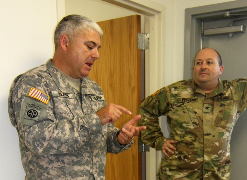 Supplying the warfighter with strategic deployment capabilities.
Col. Michael Beane, operations officer for the Deployment Support Command based in Birmingham, Ala., and COL Kenneth Fetzer, 1190th Transportation Brigade Commander discuss pre-established goals of Army Reserve exercise TRANS WARRIOR 2016.  The exercise lasted from July 9 to July 23, 2016 and provided the troops an opportunity to train on fundamental Soldier skills. (U.S. Army Reserve photo by 1st Sgt. Timothy Lawn, 205th Press Camp Headquarters)