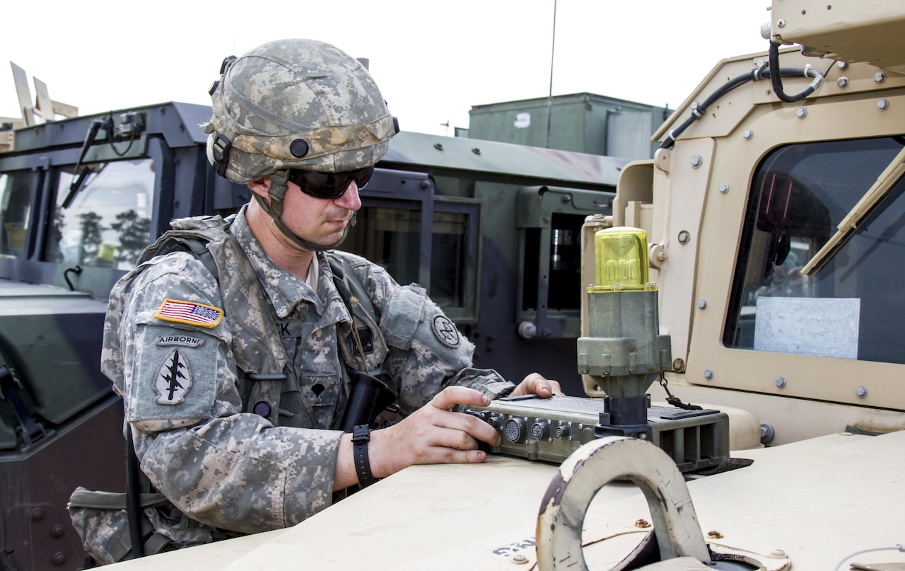 New York Army National Guard Spc. Joseph Lebeck, a logistics noncommissioned officer in Headquarters Company, 1st Battalion, 69th Infantry, makes last-minute adjustments to the Multiple Integrated Laser Engagement System sensors on his Humvee at the Joint Rotational Training Center at Fort Polk, La., July 16, 2016. More than 3,000 New York Army National Guard soldiers deployed to Fort Polk for a July 9-30 exercise at the JRTC. Army National Guard photo by Sgt. Michael Davis