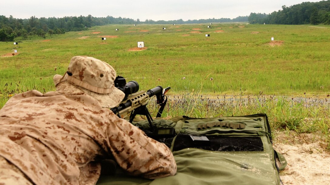 A Marine Sniper prepares to fire a 7.62mm NATO through a M40A6 rifle with a chronograph attached during a market research caliber study July 13, at Fort A.P. Hill, Va. Marine Corps Systems Command’s Infantry Weapons Systems conducted the study to inform Marine Corps acquisition leaders about future Marine sniper weapon system requirements.