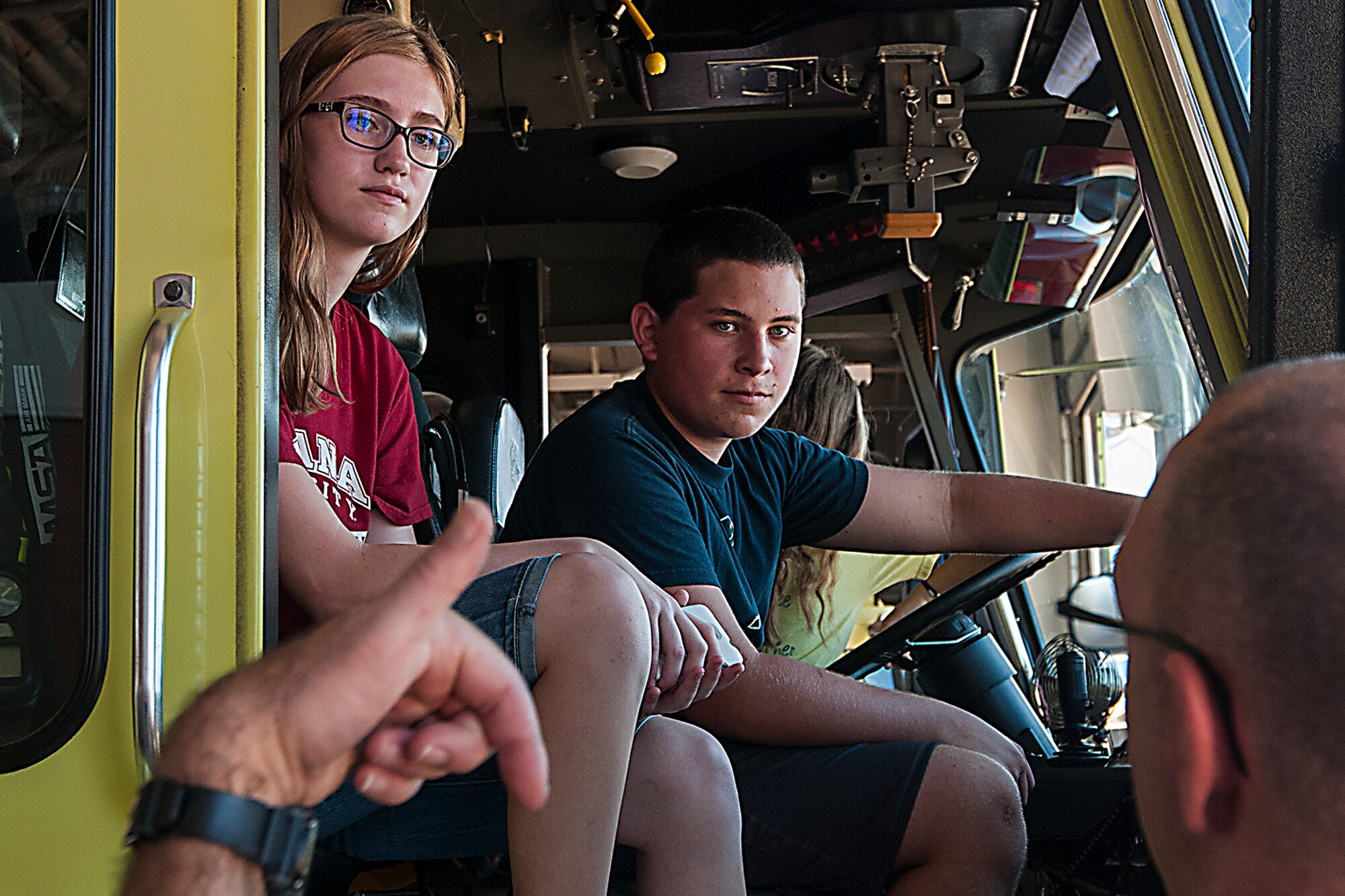 Scouts from the Kokomo and Marion troops sit in a fire truck July 27, 2016 during a visit to Grissom Air Reserve Base, Ind. The scouts visited as part of a community outreach program which offers tours to qualified groups. (U.S. Air Force photo/Senior Airman Dakota Bergl)