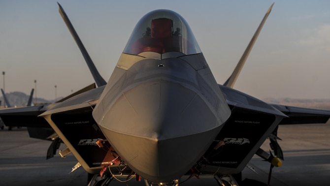 An F-22A Raptor, assigned to the 27th Fighter Squadron, Joint Base Langley-Eustis, Va., sits on the runway during Red Flag 16-3 at Nellis Air Force Base, July 25, 2016. Red Flag provides an opportunity for aircrew and military aircraft the ability to enhance their tactical operational skills alongside military aircraft from coalition forces. (U.S. Air Force photo by Airman 1st Class Kevin Tanenbaum/Released)