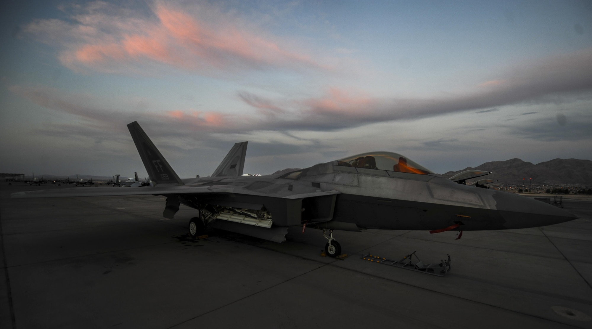 An F-22A Raptor, assigned to the 27th Fighter Squadron, Joint Base Langley-Eustis, Va., sits on the runway during Red Flag 16-3 at Nellis Air Force Base, July 25, 2016. Red Flag is a realistic combat exercise involving multiple military branches conducting training operations on the 15,000 square mile Nevada Test and Training Range. (U.S. Air Force photo by Airman 1st Class Kevin Tanenbaum/Released)