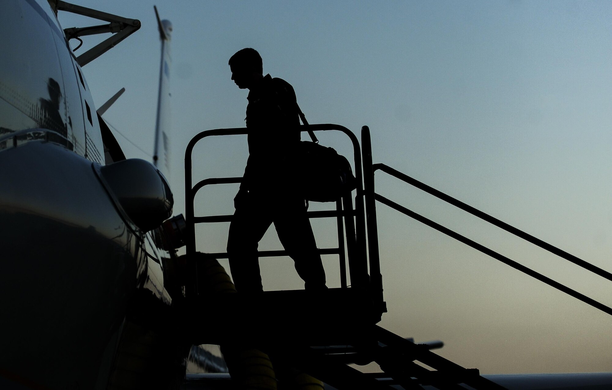 A pilot assigned to the 38th Reconnaissance Squadron Offutt Air Force Base, Neb., boards an RC-135 before night operations during Red Flag 16-3 at Nellis Air Force Base, Nev., July 26, 2016. Red Flag enhances aircrew’s combat readiness and survivability by challenging them with realistic combat scenarios. (U.S. Air Force photo by Airman 1st Class Kevin Tanenbaum/Released)  