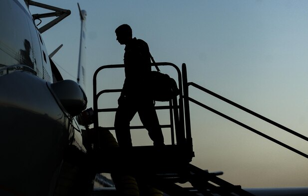 A pilot assigned to the 38th Reconnaissance Squadron Offutt Air Force Base, Neb., boards an RC-135 before night operations during Red Flag 16-3 at Nellis Air Force Base, Nev., July 26, 2016. Red Flag enhances aircrew’s combat readiness and survivability by challenging them with realistic combat scenarios. (U.S. Air Force photo by Airman 1st Class Kevin Tanenbaum/Released)  