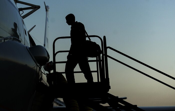 A pilot assigned to the 38th Reconnaissance Squadron Offutt Air Force Base, Neb., boards an RC-135 before night operations during Red Flag 16-3 at Nellis Air Force Base, Nev., July 26, 2016. Red Flag enhances aircrew’s combat readiness and survivability by challenging them with realistic combat scenarios. (U.S. Air Force photo by Airman 1st Class Kevin Tanenbaum/Released)  