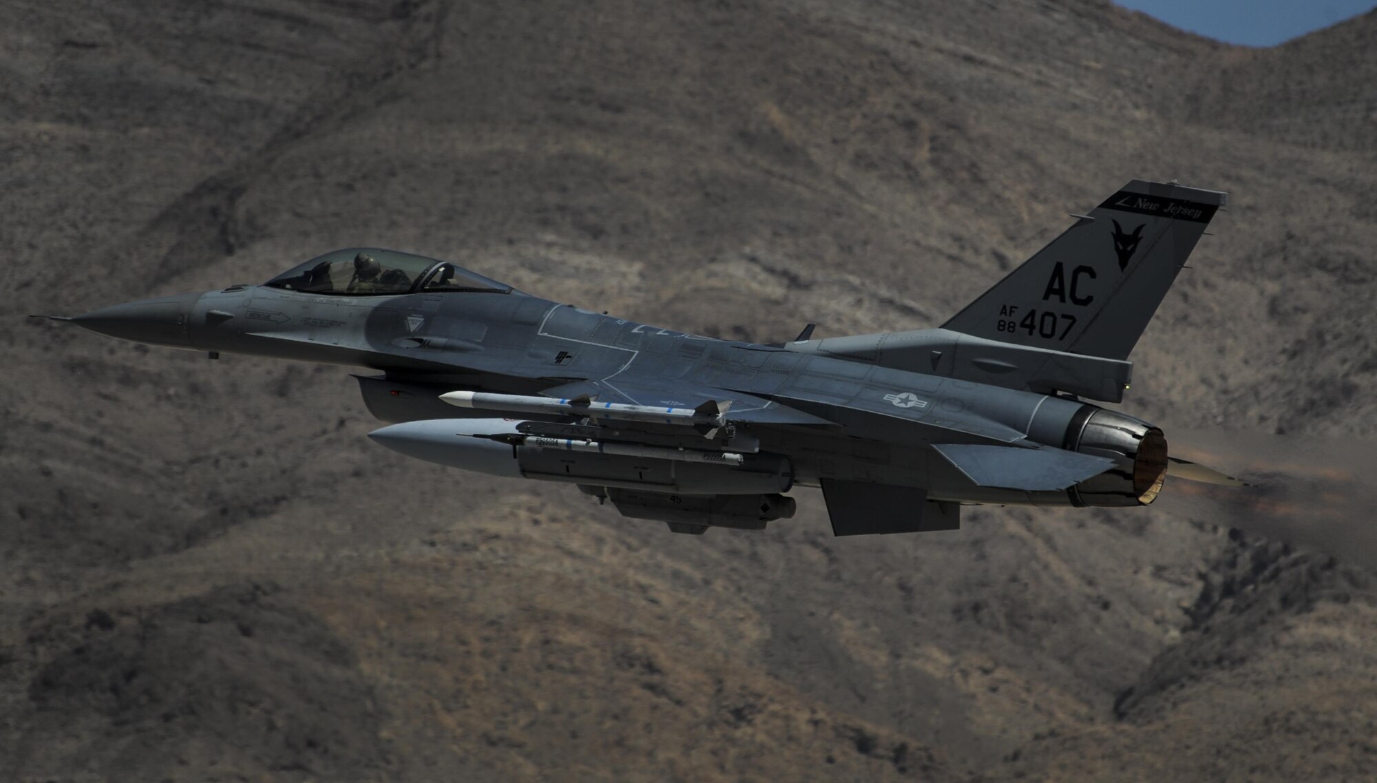 An F-16C, assigned to the 119th Fighter Squadron, Atlantic City Air National Guard Base, N.J., takes off on the first day of Red Flag 16-3 at Nellis Air Force Base, Nev., July 11, 2016. Red Flag is a realistic combat exercise involving multiple military branches conducting training operations on the 15,000 square mile Nevada Test and Training Range. (U.S. Air Force photo by Airman 1st Class Kevin Tanenbaum/Released)