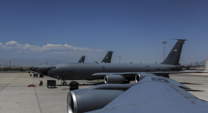 KC-135 Stratotankers, assigned to the 22nd Air Refueling Wing, McConnell Air Force Base, Kan., and the 92nd Air Refueling Wing, Fairchild Air Force Base, WA., sit on the flightline at Nellis Air Force Base, Nev. flightline prior to take-off during Red Flag 16-3, July 27, 2016. The air-to-air combat training exercise is conducted over the 2.9 million acre Nevada Test and Training Range. (U.S. Air Force photo by Airman 1st Class Kevin Tanenbaum/Released)