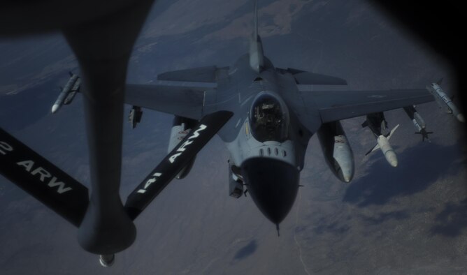 An F-16CJ, assigned to the 79th Fighter Squadron, Shaw Air Force Base, S.C., approaches a KC-135 for refueling during Red Flag 16-3 over the Nevada Test and Training Range, July 27, 2016. Red Flag involves a variety of attack, fighter, bomber, reconnaissance, electronic warfare, airlift support, and search and rescue aircraft. (U.S. Air Force photo by Airman 1st Class Kevin Tanenbaum/Released)