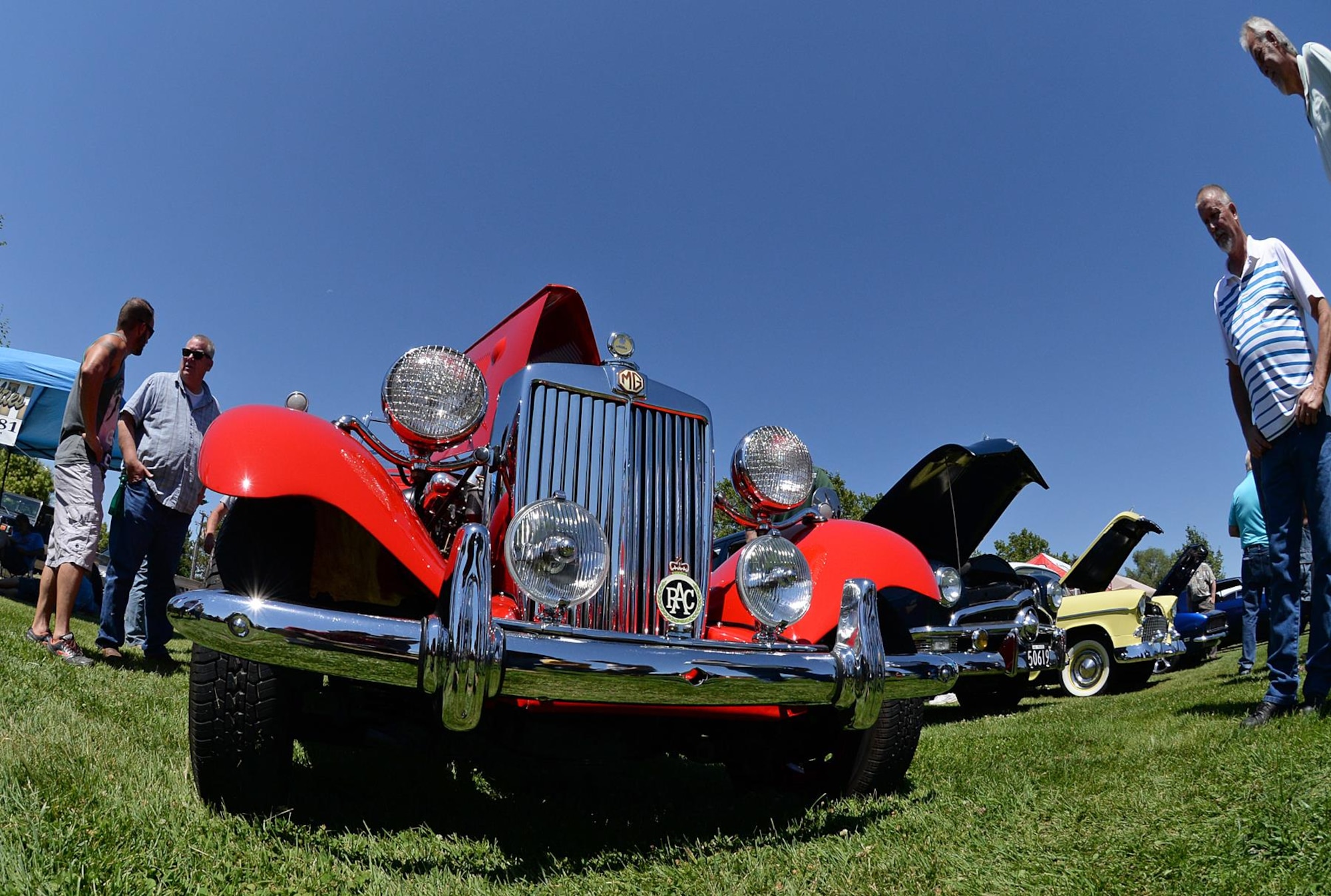 Car enthusiasts stop to look at a 1951 MDT during the Ogden Air Logistics Complex Car Show held July 27 at Hill Air Force Base, Utah. The car won the Best Restoration prize. (U.S. Air Force photo by Alex R. Lloyd)