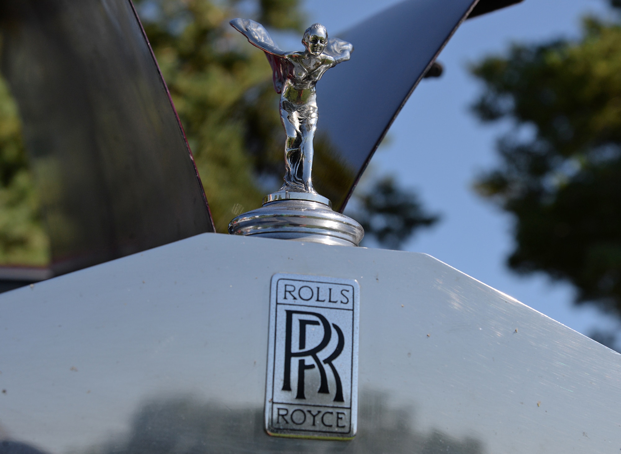 The Spirit of Ecstasy, also called "Emily," "Silver Lady" or "Flying Lady," shines brightly on a 1957 Rolls-Royce owned by Richard Fewkes, 309th Missile Maintenance Group. (U.S. Air Force photo by Alex R. Lloyd)