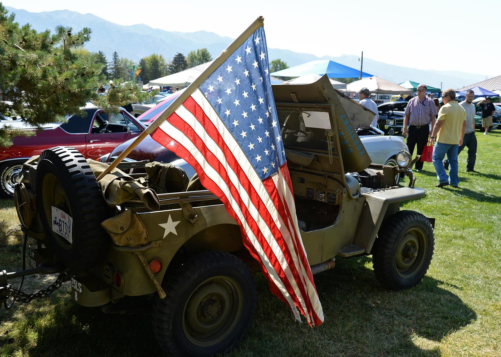 Greg Brubaker, 517th Software Maintenance Squadron, flies the flag proudly on his a 1944 Willys Jeep. The jeep has been used as a prop in several movies. It also won Best Unique Vehicle during the show. (U.S. Air Force photo by Alex R. Lloyd)