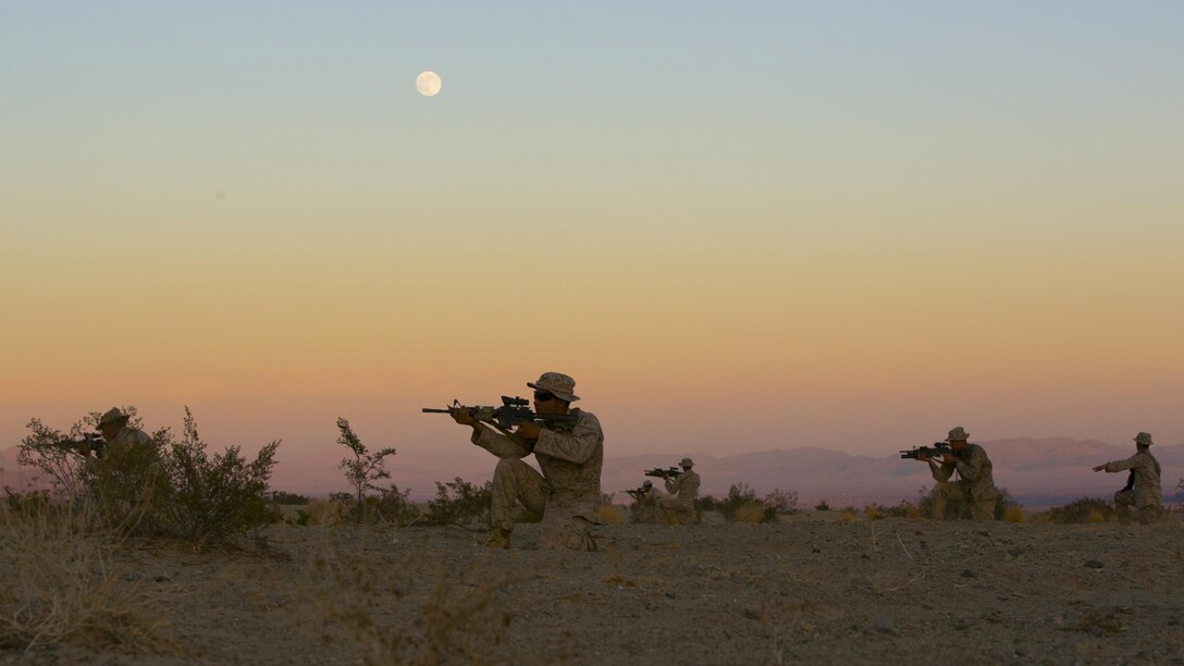 A squad of Marines with 3rd Battalion, 4th Marines, 7th Marine Regiment, practice dry runs before their night time live-fire exercises as part of Tactical Small-Unit Leadership Course aboard Marine Corps Air Ground Combat Center, Twentynine Palms, Calif., July 18, 2016. The purpose of the course was to focus on the training of small-unit leadership within “Darkside.” (Official Marine Corps photo by Lance Cpl. Dave Flores/Released)