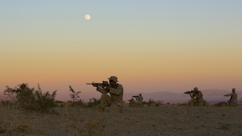 A squad of Marines with 3rd Battalion, 4th Marines, 7th Marine Regiment, practice dry runs before their night time live-fire exercises as part of Tactical Small-Unit Leadership Course aboard Marine Corps Air Ground Combat Center, Twentynine Palms, Calif., July 18, 2016. The purpose of the course was to focus on the training of small-unit leadership within “Darkside.” (Official Marine Corps photo by Lance Cpl. Dave Flores/Released)