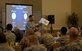 Chief Master Sgt. Anthony Fisher, Profession of Arms Center of Excellence superintendent, reads from “Have You Filled a Bucket Today?” by Carol McCloud during an “Enhancing Human Capital” seminar, July 27, 2016, at Seymour Johnson Air Force Base, North Carolina. The seminar covered various topics including, phenomenon of entrenched thinking, the attributes and dangers of personal bias among many others. (U.S. Air Force photo by Airman Shawna L. Keyes) 