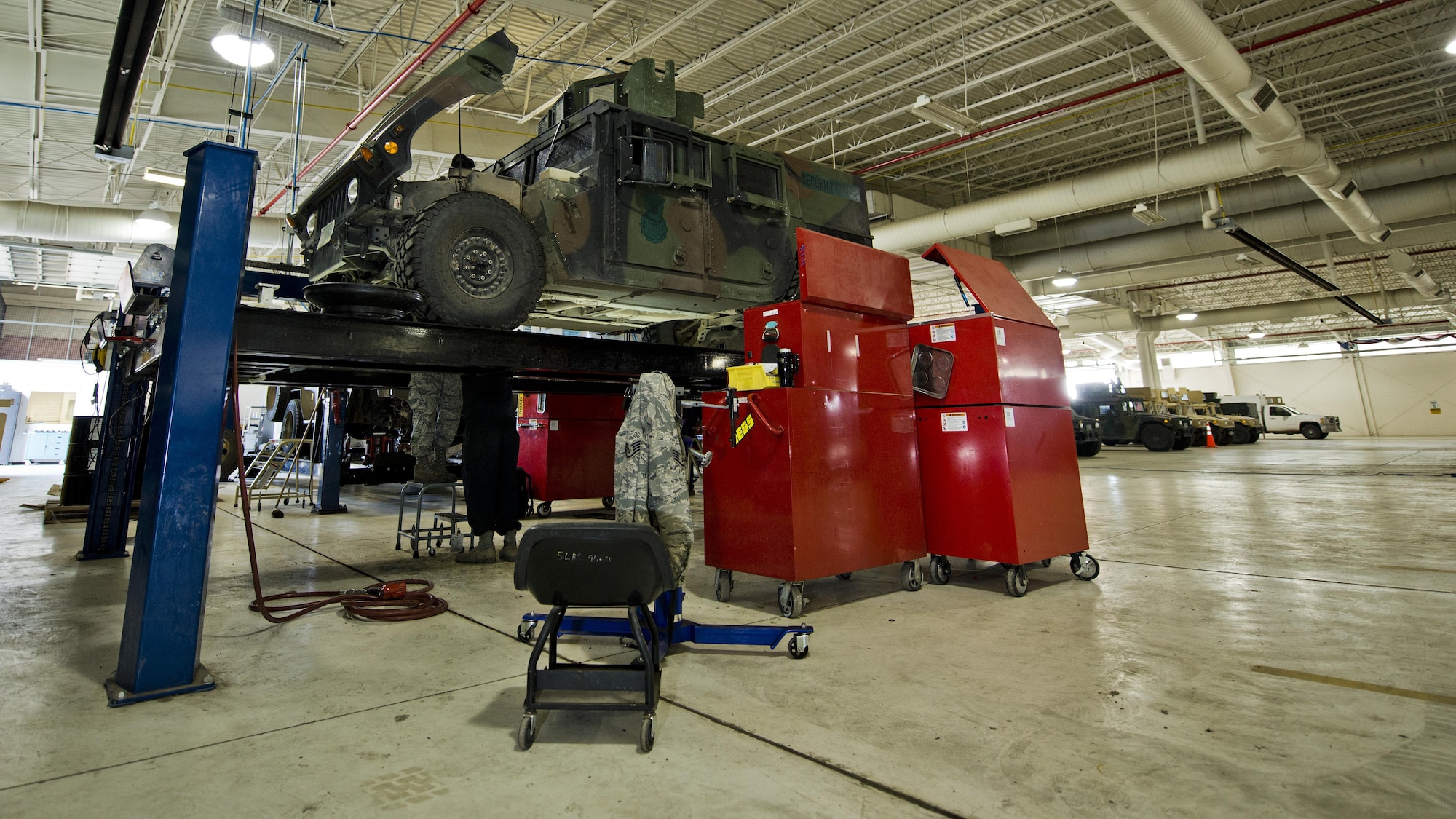 Airmen from the 5th Logistics Readiness Squadron maintain a Humvee in the Defender Dome at Minot Air Force Base, N.D., July 28, 2016. The 91st Security Support Squadron is specifically responsible for preventative maintenance inspections and troubleshooting, and everything from electrical repair to transmission replacement, on armored Humvees and Bearcats. (U.S. Air Force photos/Airman 1st Class J.T. Armstrong)
