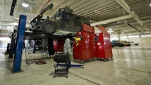 Airmen from the 5th Logistics Readiness Squadron maintain a Humvee in the Defender Dome at Minot Air Force Base, N.D., July 28, 2016. The 91st Security Support Squadron is specifically responsible for preventative maintenance inspections and troubleshooting, and everything from electrical repair to transmission replacement, on armored Humvees and Bearcats. (U.S. Air Force photos/Airman 1st Class J.T. Armstrong)